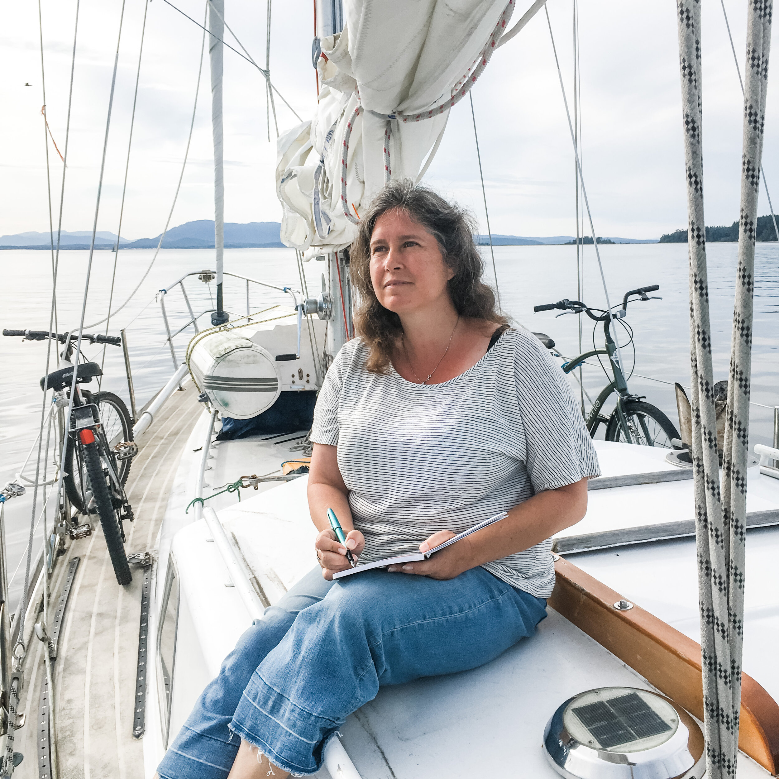 Andrea Painting On Her Sailboat